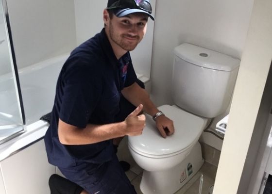 RTL Plumber installing new toilet RTL Plumber installing new toilet